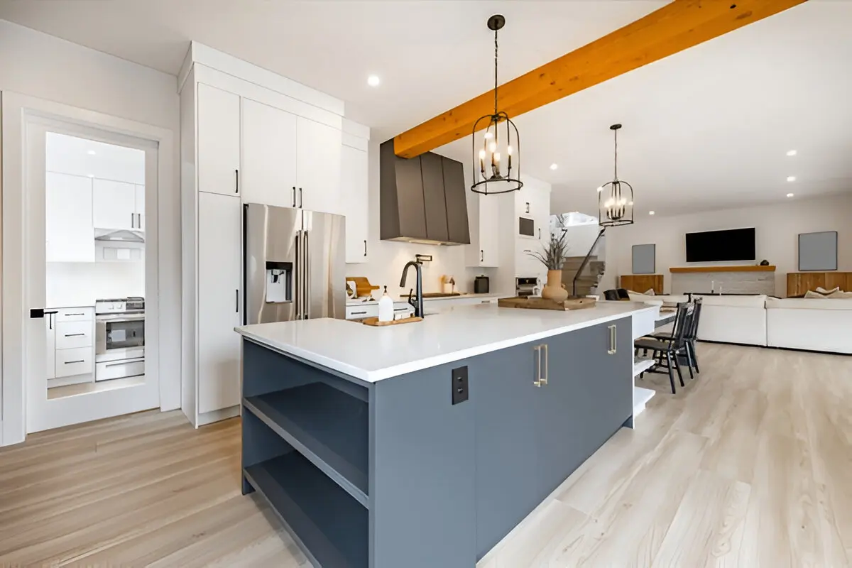 Renovision Design & Build construction company transforming a kitchen with custom cabinetry and elegant finishes.